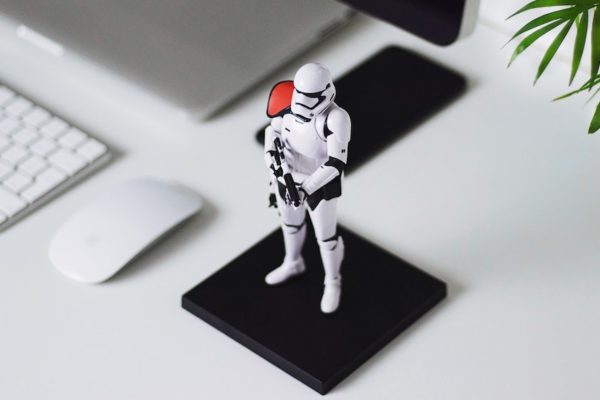 Star Wars stormtrooper mini next to console, representing protection from identity theft