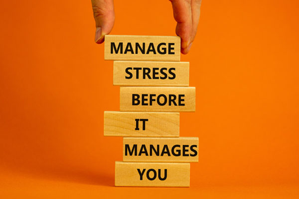 "Manage stress before it manages you" on blocks