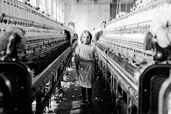 Child laboring in a factory