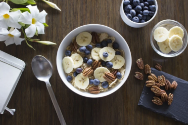 Bowl of cereal with walnuts and fruit