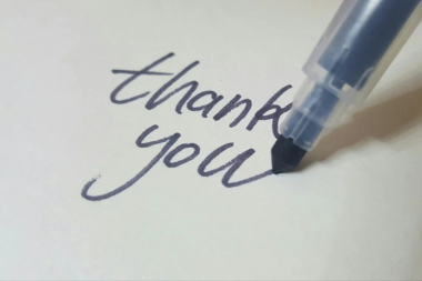 "Thank you" written with a pen