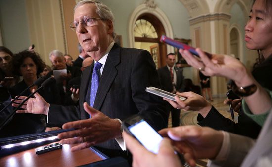 Senate Minority Leader Mitch McConnell answers questions from the press