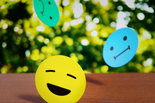 Smiley faces with different emotions expressed on them