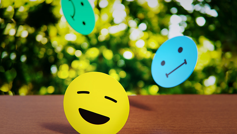 Smiley faces with different emotions expressed on them