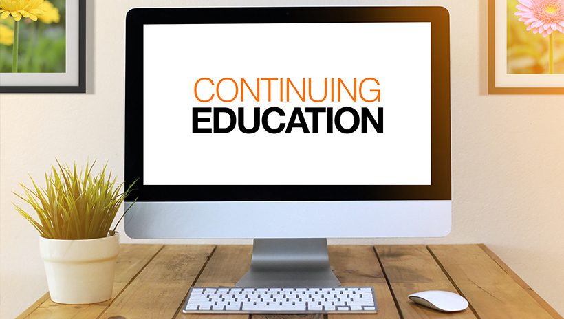 computer monitor with "Continuing Education" on the screen
