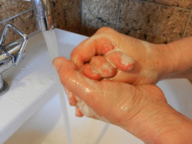 Hands being washed