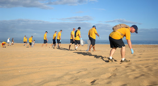 Volunteers cleaning a beach