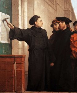 Martin Luther hammers his 95 theses to the door (by Ferdinand Pauwels)